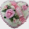 Pink funeral grave wreath tribute